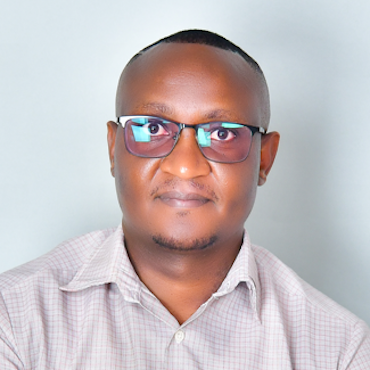 John T Kariuki